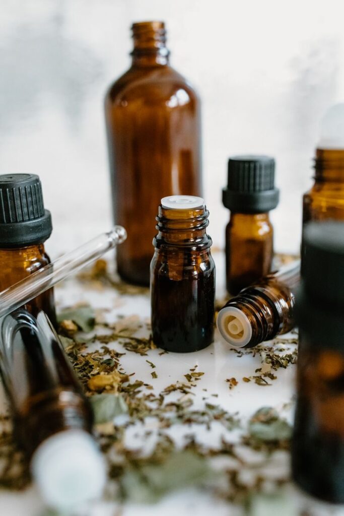 A close-up of amber bottles with essential oils, showcasing natural healing properties.